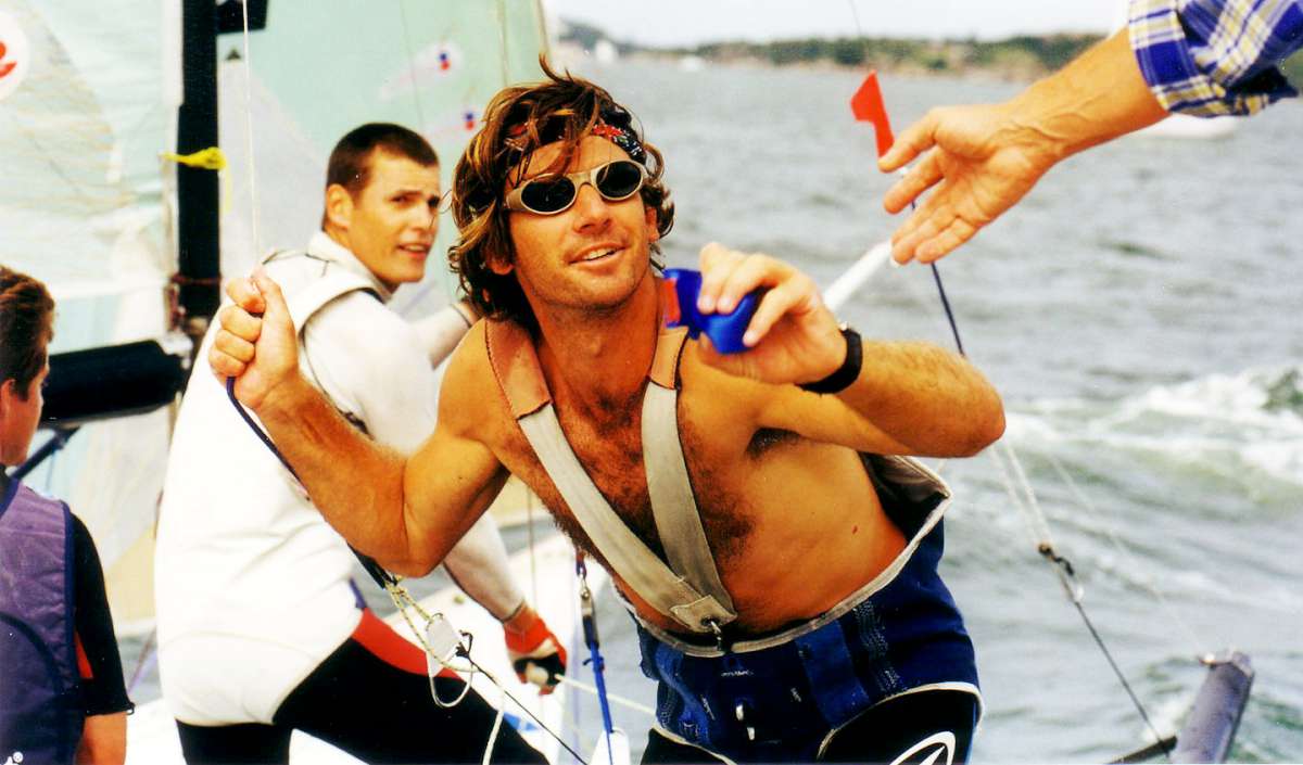David Witt accepts the blue ribbon for the Rockport 1999 worlds victory (Frank Quealey)