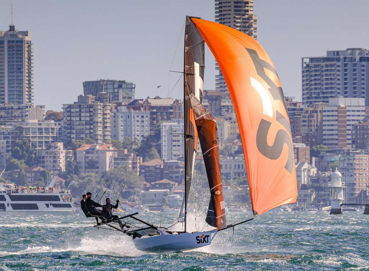 An airborne southerly spinnaker run in Race 1 of the 2024 Spring Championship (SailMedia)