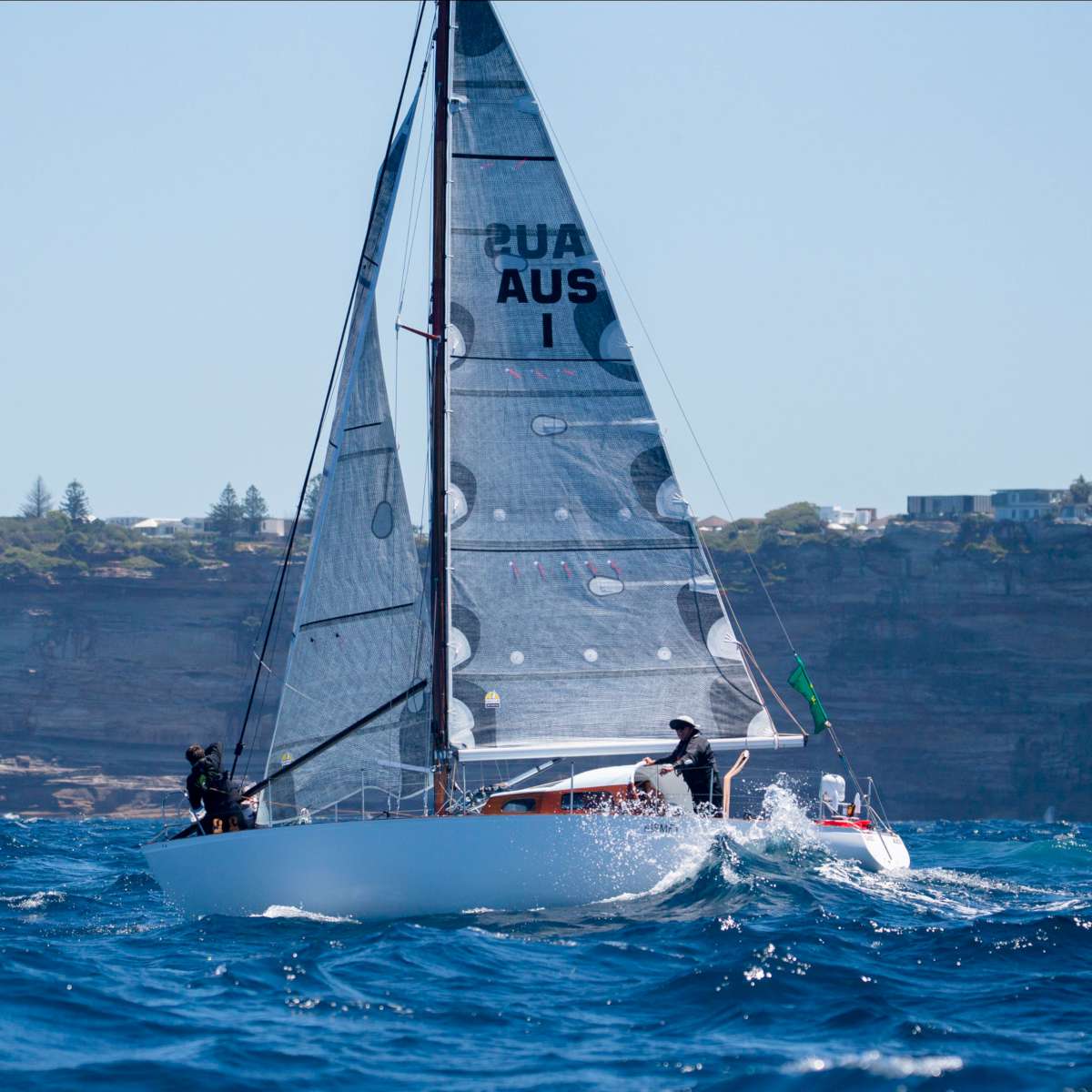Langman at the bow of Kismet in the 2024 Rolex Sydney Hobart. Credit - Ashley Dart | CYCA