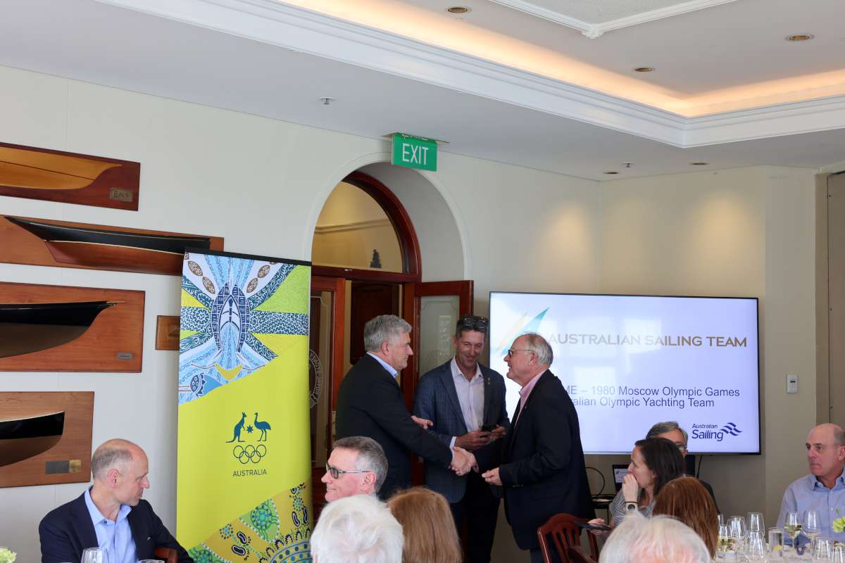 AOC President and Australian CEO Malcolm Page distributed Olympic Pins