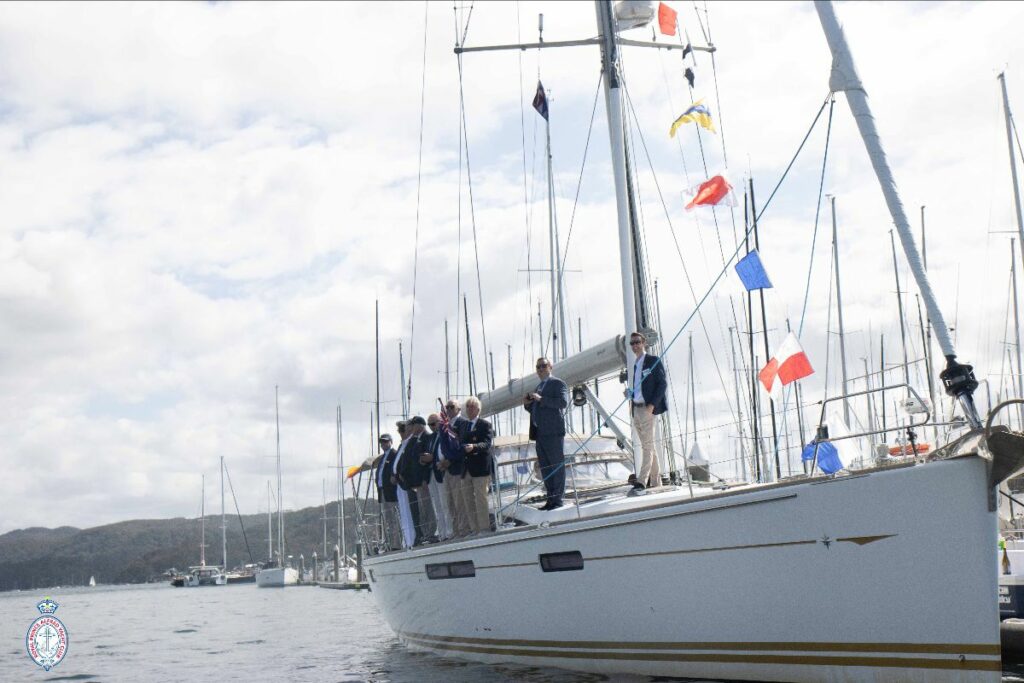 The Commodore, RPAYC on First Picasso saluting the fleet on Opening Day 2025 - Credit RPAYC Media
