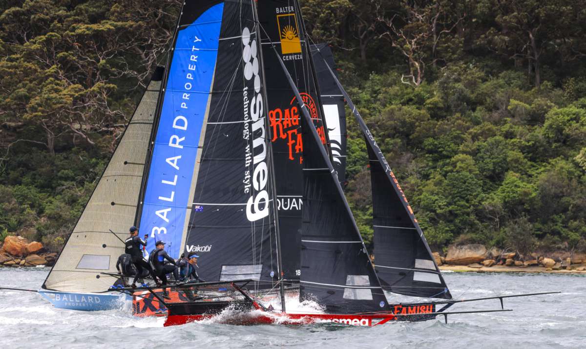 Smeg leads a tightly bunched group at the weather mark in Race 3 (SailMedia)