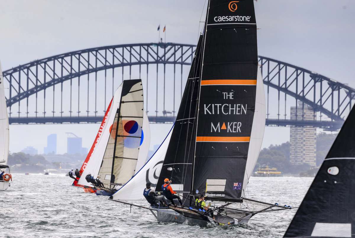 The Kitchen Maker chases the leaders down the first spinnaker run (SailMedia)
