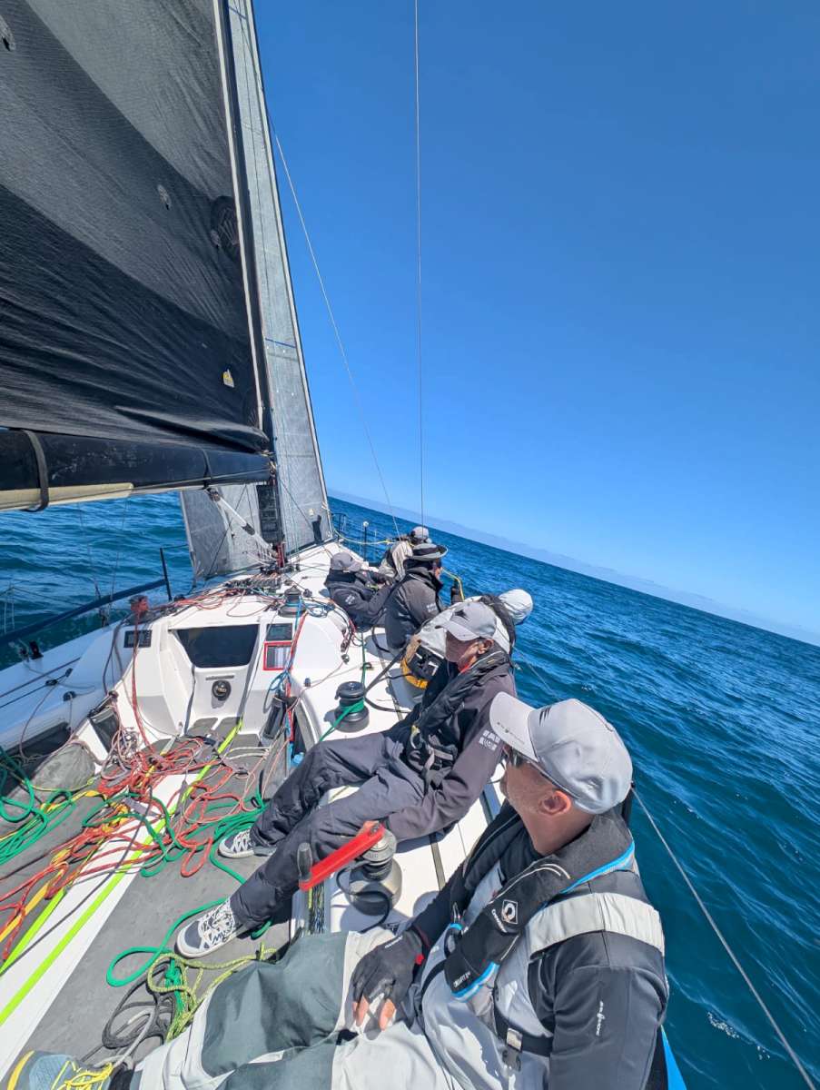 The crew of The Jackal cruising at 8-12 knots outside Port Phillip Heads. Photo credit Matt Setton