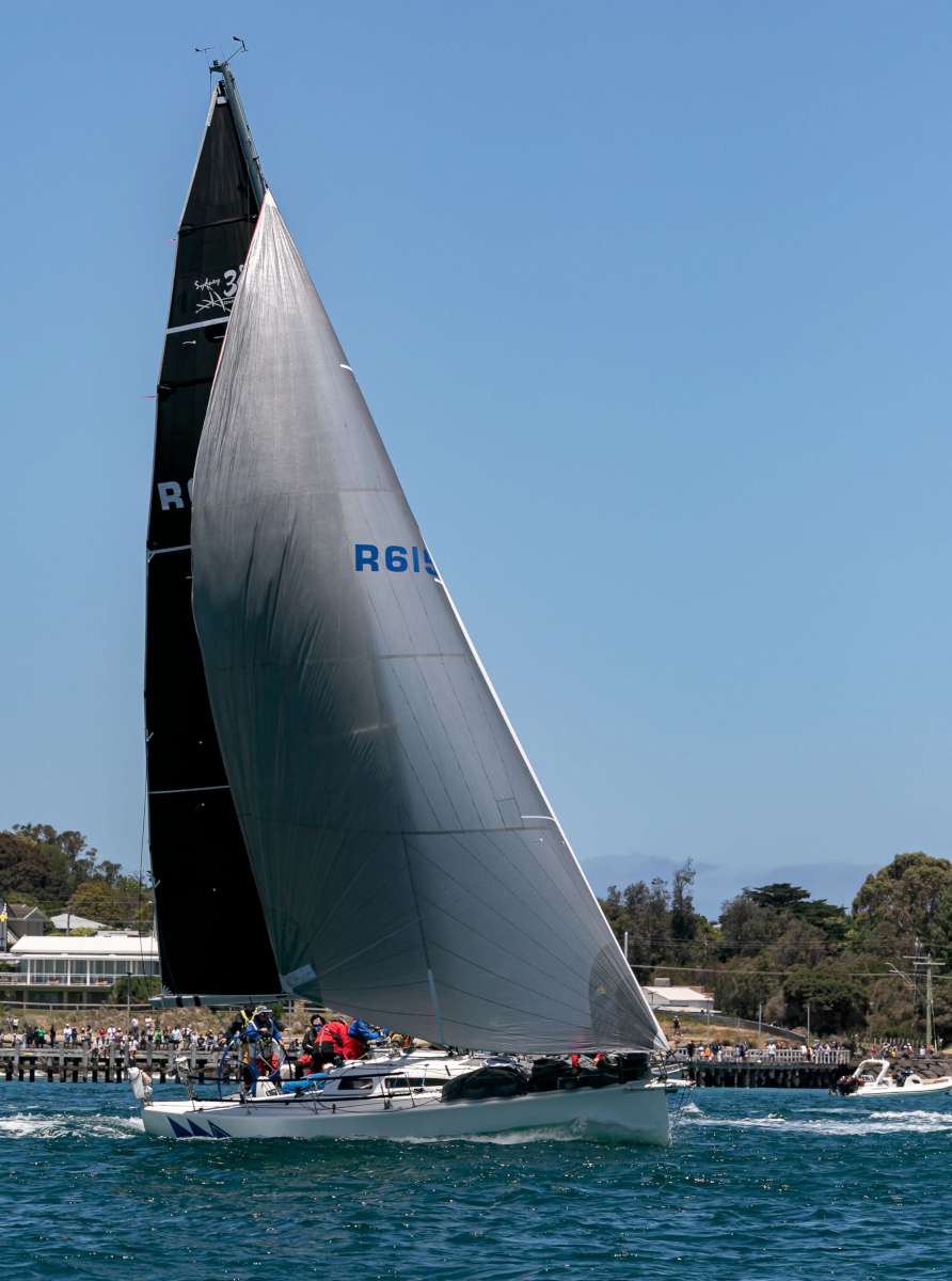 Faster Forward is farewelled by spectators in the 2025 Melbourne to Hobart Yacht Race. Photo credit Al Dillon