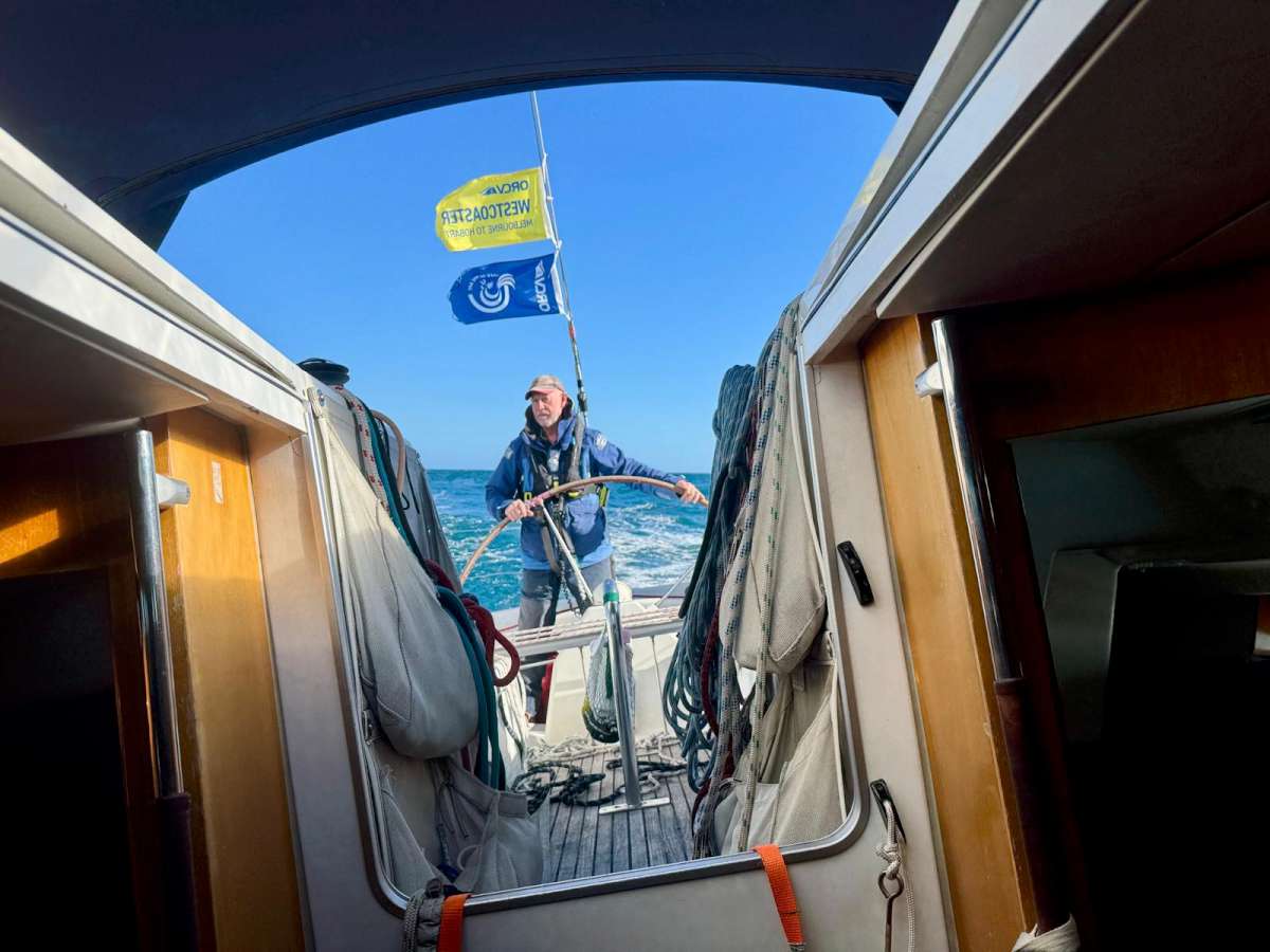 Vagabond skipper Andrew McConchie a picture of concentration in the 2025 Melbourne to Hobart Yacht Race. Photo credit Christopher Howe