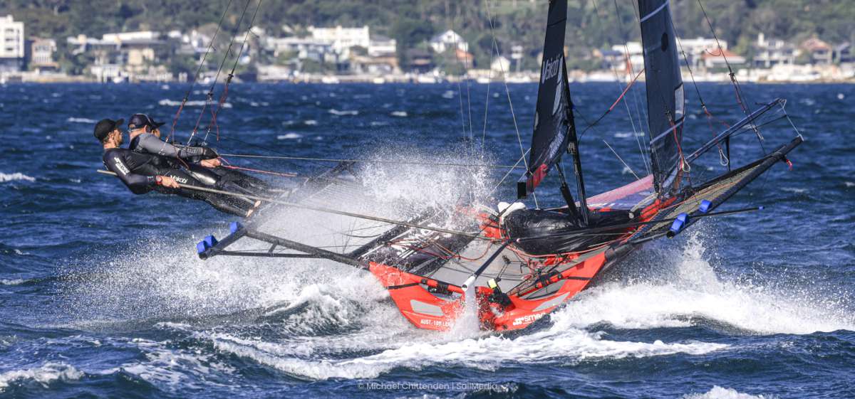 Smeg crew powers into the 20-knot plus NE wind on Sydney Harbour (SailMedia)