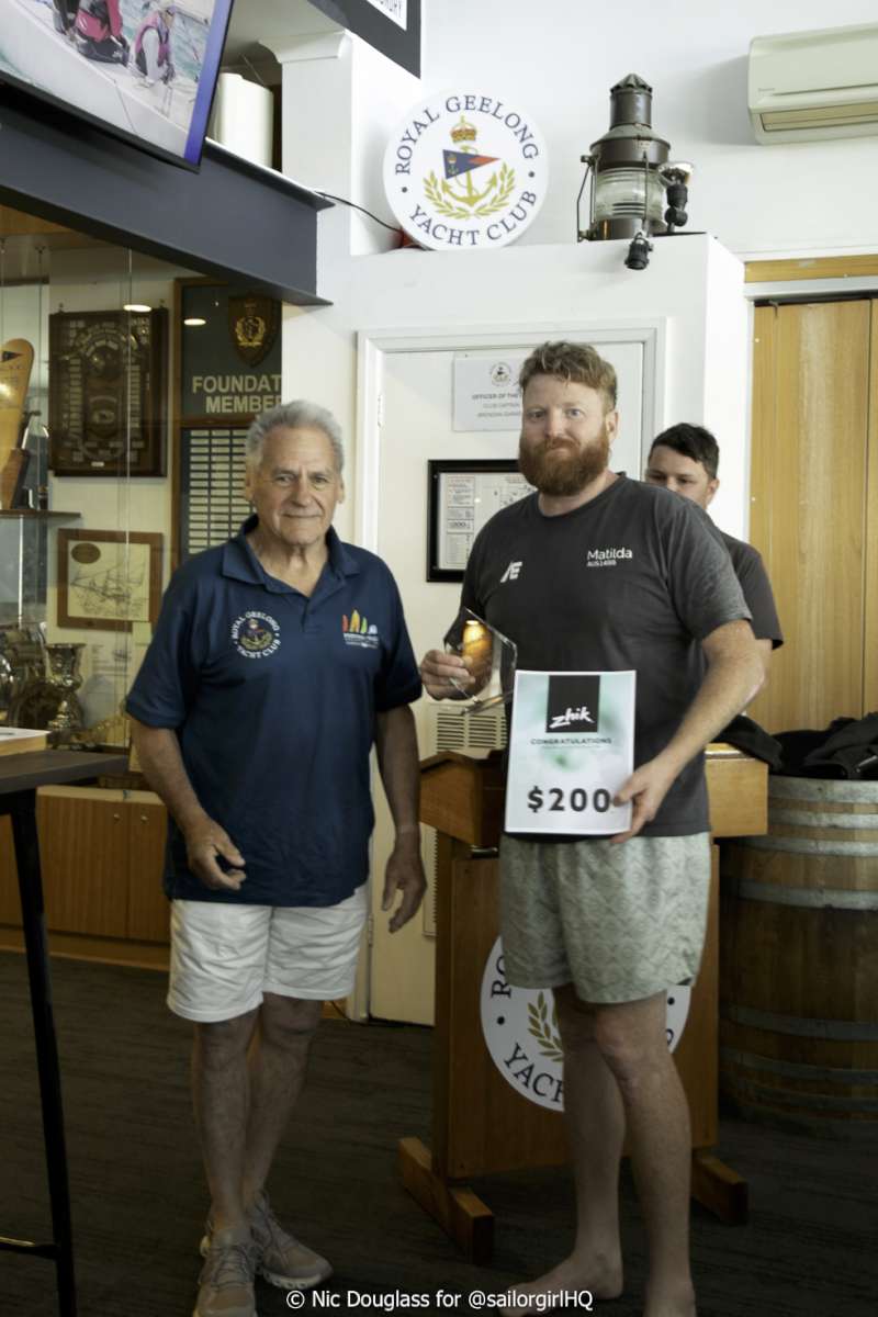 Paul Bucholz presenting Blake Robertson with the first Corithian Trophy - Credit - Sunset Media - @sailorgirlhq