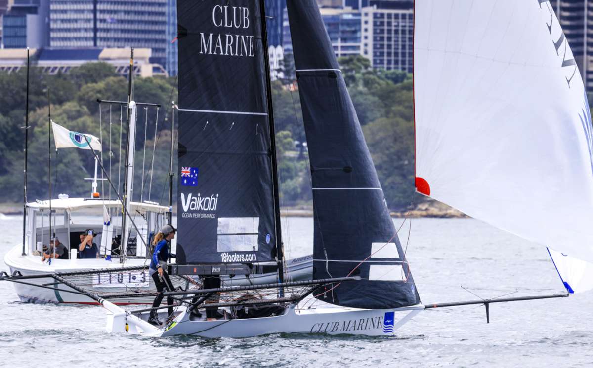 Emma Rankin crosses the finish line to become the first female to win a heat of an Australian 18ft skiff championship (SailMedia)