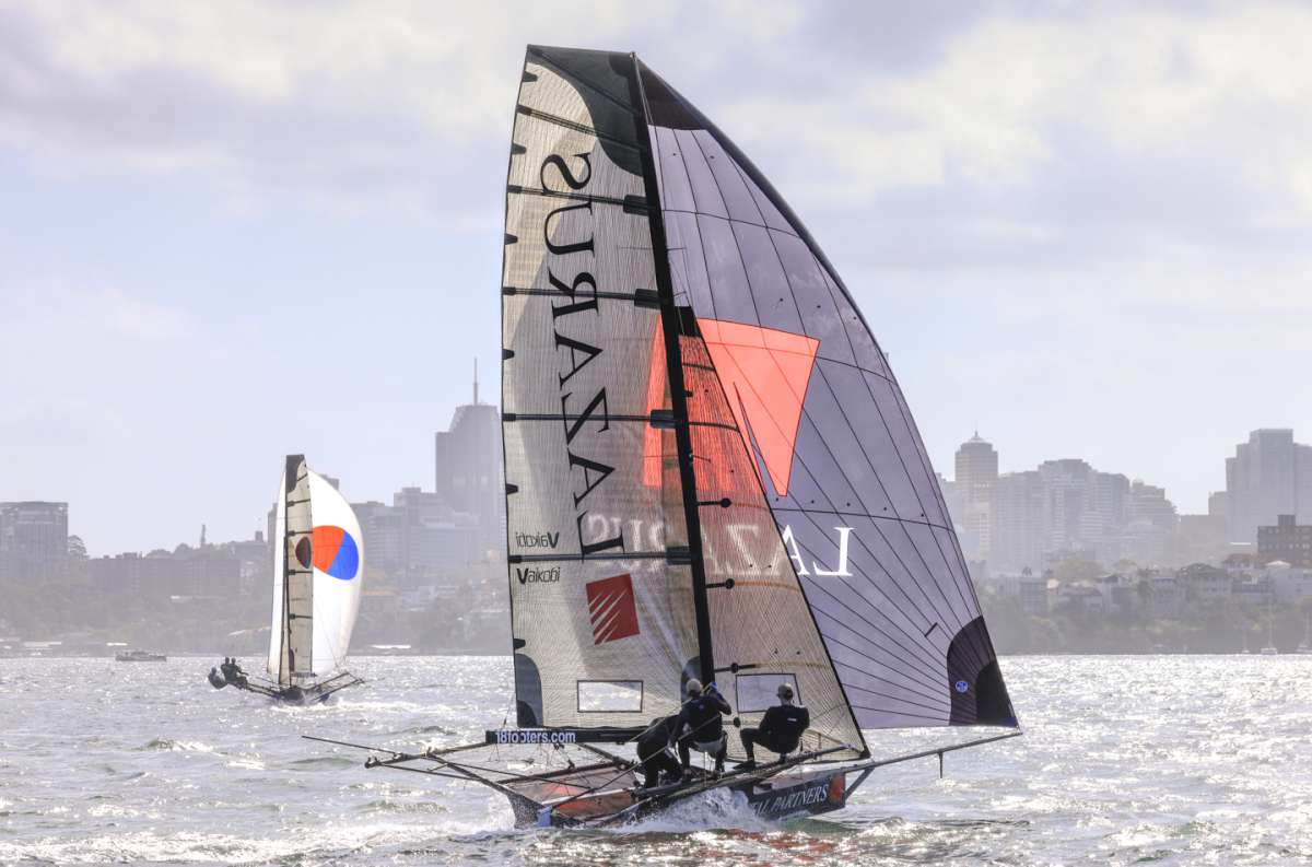 Yandoo heads for the finish line in Race 6 ahead of Lazarus (SailMedia)