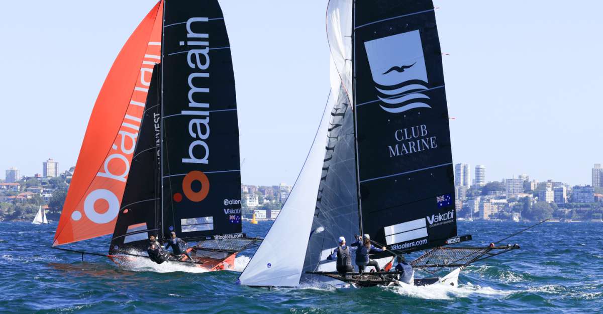 Balmain and Club Marine crews work hard on the spinnaker run (SailMedia)