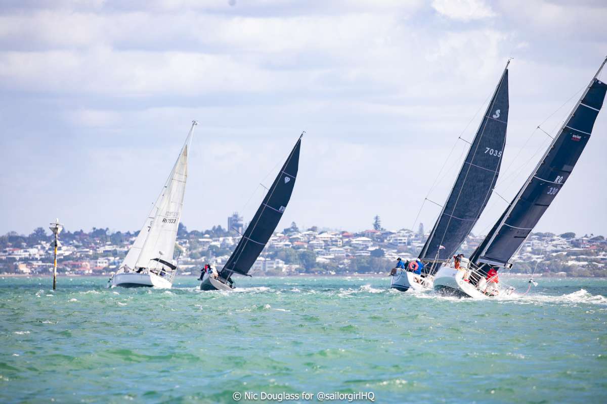 Fleet heading around the north-western marker of Green Island - Credit - Nic Douglass @sailorgirlhq