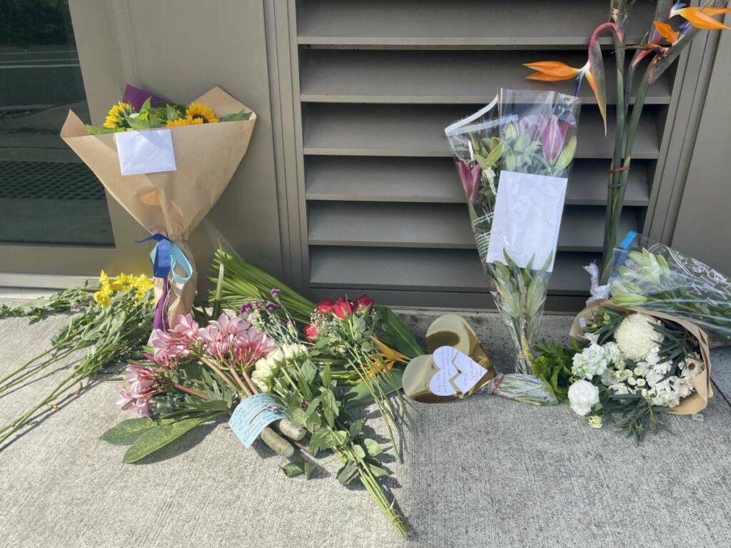 Floral tributes are being laid at the Marine Rescue Ballina base