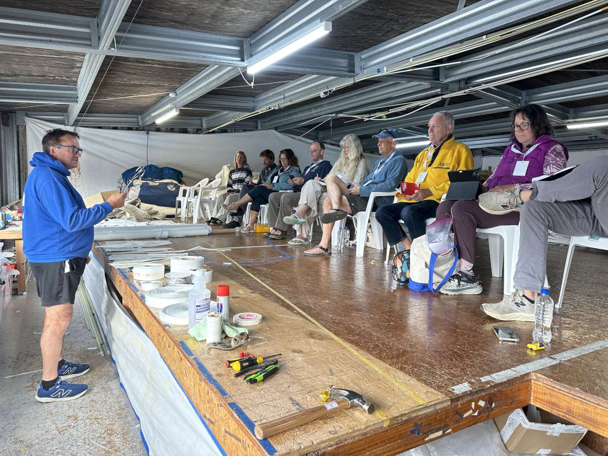 Roger from North Sails demonstrates how to repair sails at sea