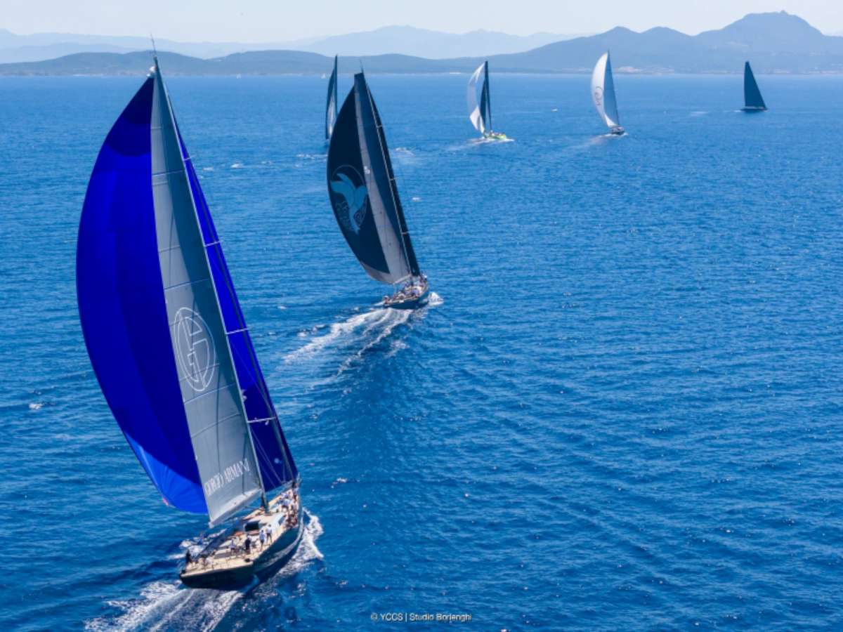 SØRVIND by Giorgio Armani in the foreground with the rest of the fleet heading towards Soffi island - Credit Studio Brolenghi