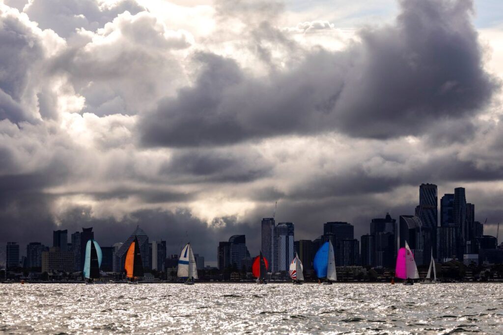 Colourful spinnakers set against dark sky last year - Andrea Francolini, AWKR pic