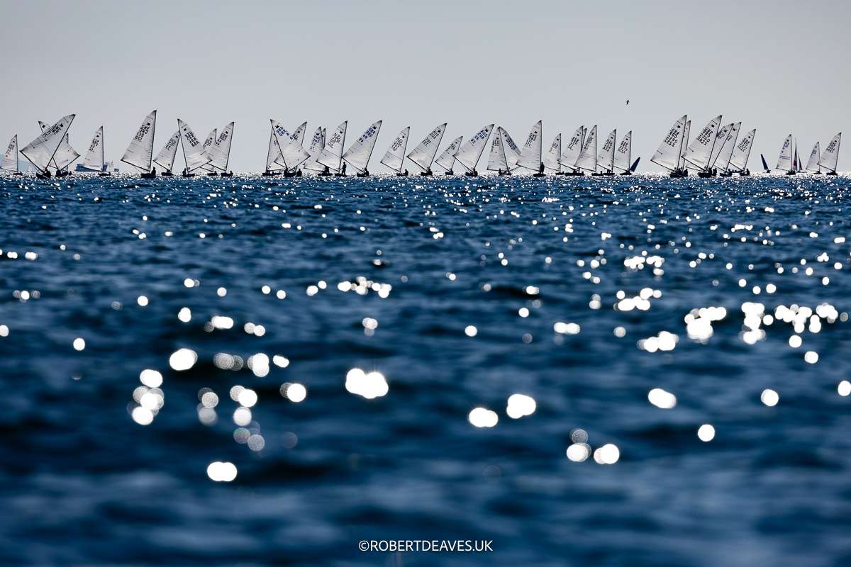 Huge fleets are becoming the norm in the OK Dinghy class - Credit Robert Deaves