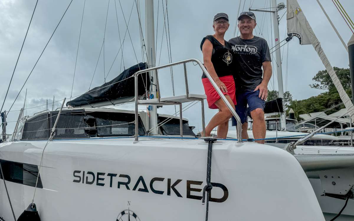 Kim Mitchell and Geoff St Clair aboard their brand-new Seawind 1370 Sidetracked