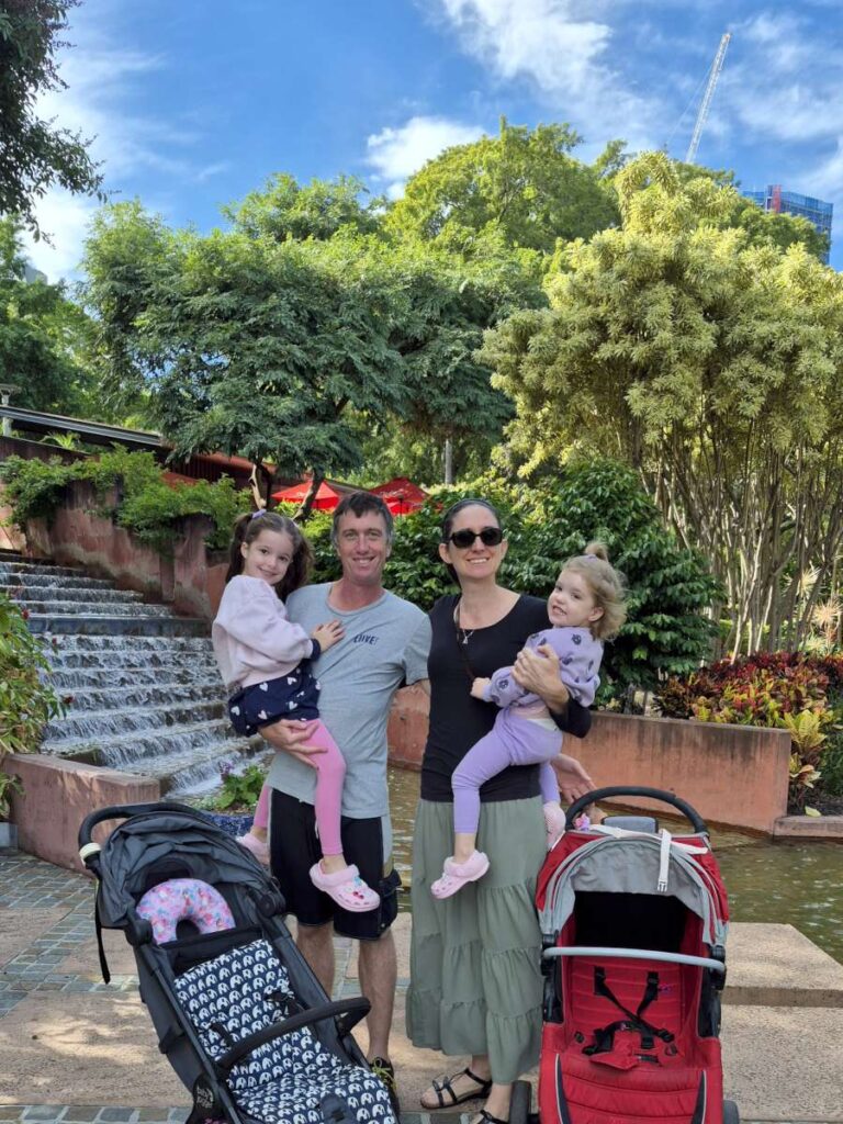 Lucy Scarrott (left) with her parents Andy and Cat and sister Ella, pictured in happier times