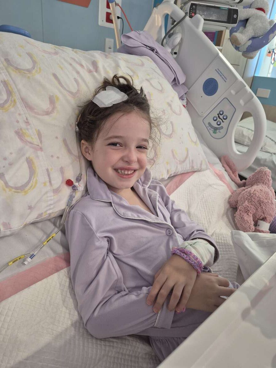 Whitsunday Escape's raffle is raising money for four-year-old Lucy Scarrott who has been diagnosed with an agressive form of brain cancer