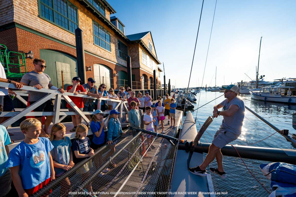 Newport’s youth sailors gathered at Midtown Race Club to learn from SailGP USA athletes including Taylor Canfield (right) and Peter Kinney (left) - Credit Hannah Lee Noll
