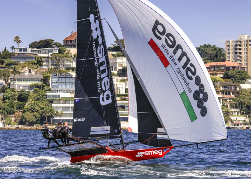 Smeg 2025-26 on a typical NE spinnaker run between Shark and Clark Islands (SailMedia)