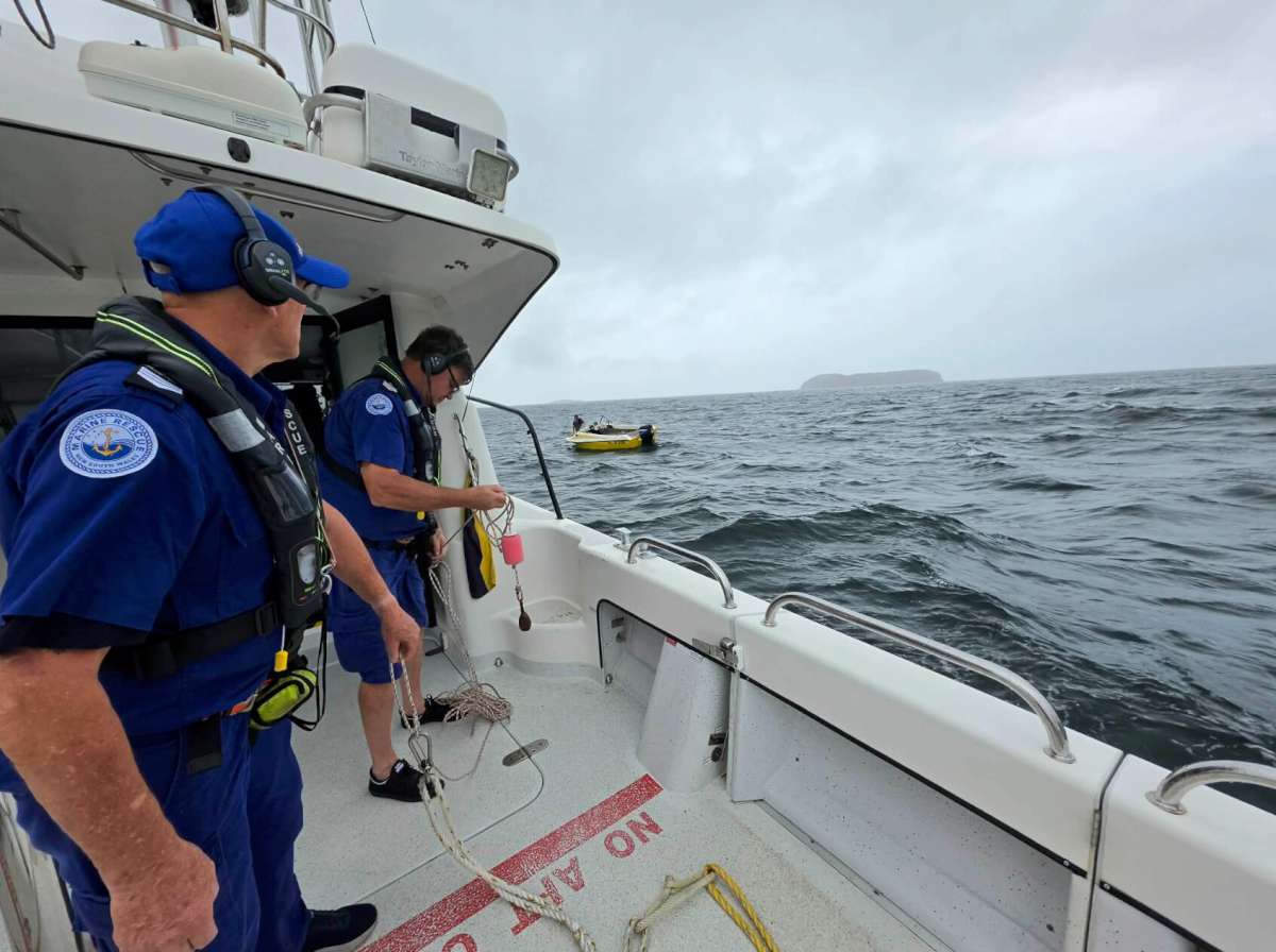 Marine Rescue NSW volunteers on board Port Stephens 31 assist a disabled vessel near Cabbage Tree Island