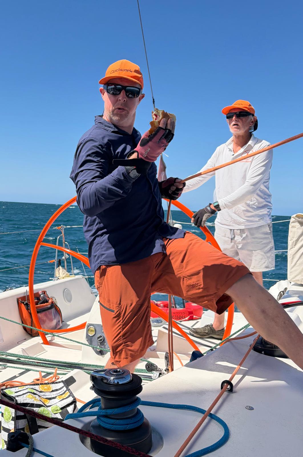 Tom Ibbott multitasking while Andy Lloyd steers Clockwork - Mary Ann Harvey, Clockwork pic
