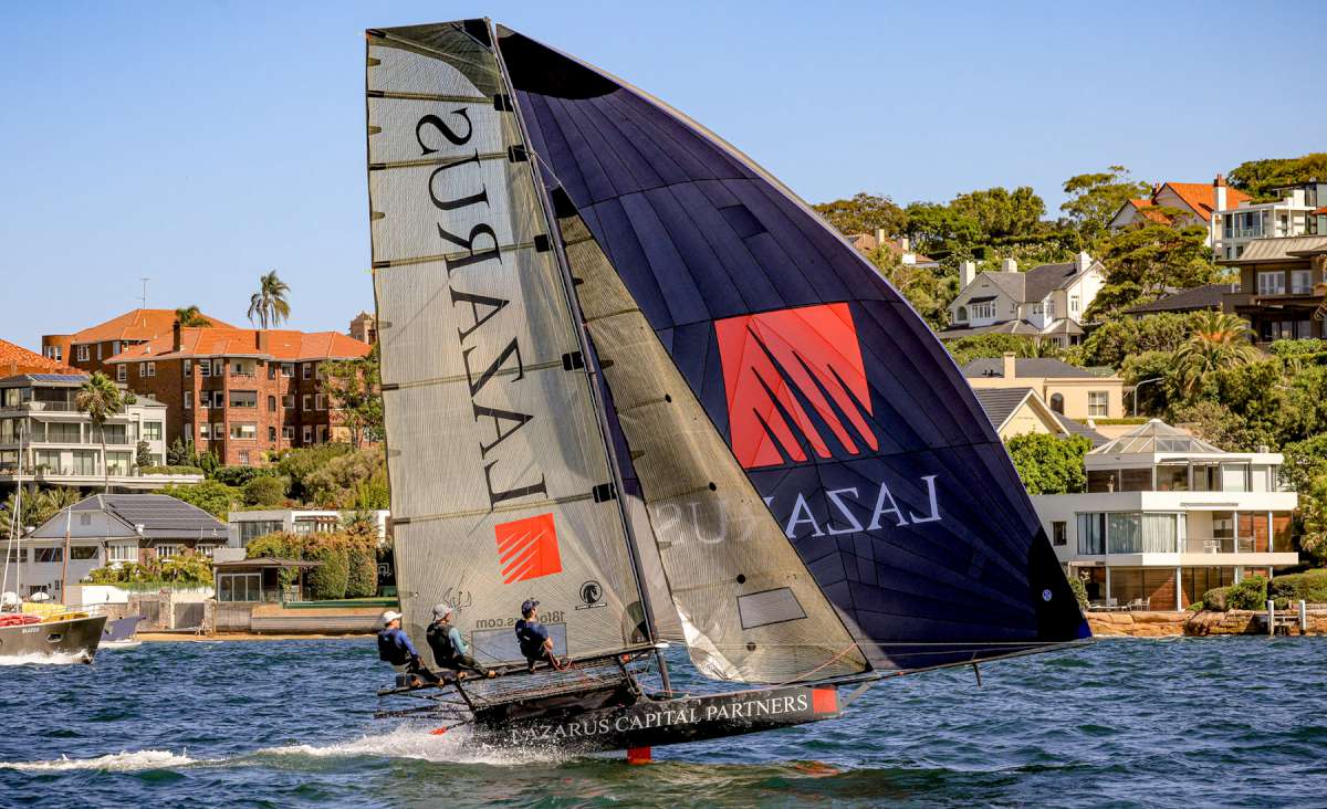 Running to the finish line with the big rig in a NE wind (SailMedia)