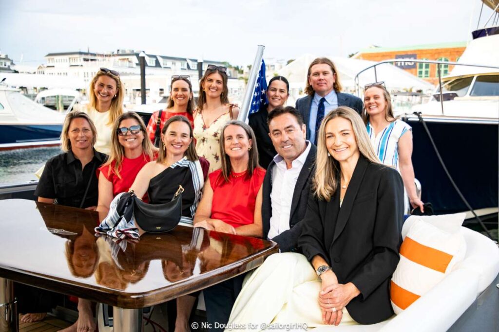 The full team, including coach, with Mark Richard, CEO and Founder of Palm Beach Motor Yachts - Credit - Sunset Media - @sailorgirlhq