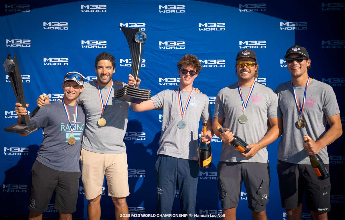 YoungBlood hoists M32 World Championship Trophies for Overall and Corinthian Helm - Credit Hannah Lee Noll