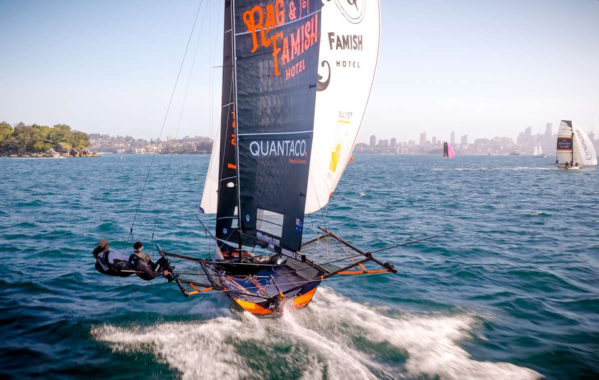 Rag & Famish Hotel powers down the spinnaker run (SailMedia)