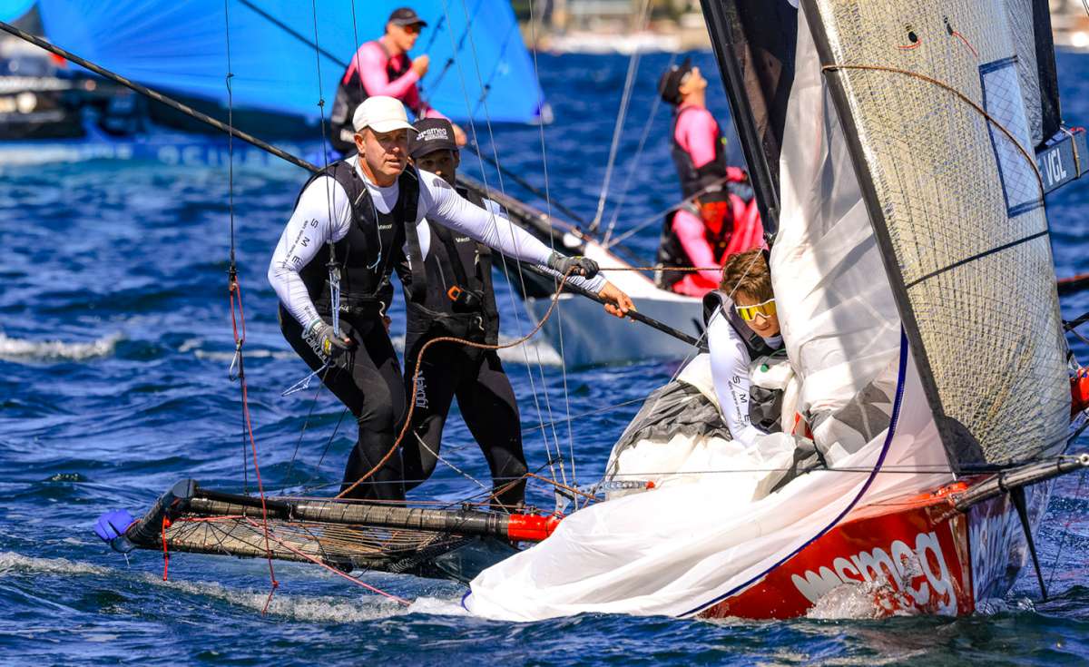 Concentration by Smeg's crew as they approach the bottom mark (SailMedia)